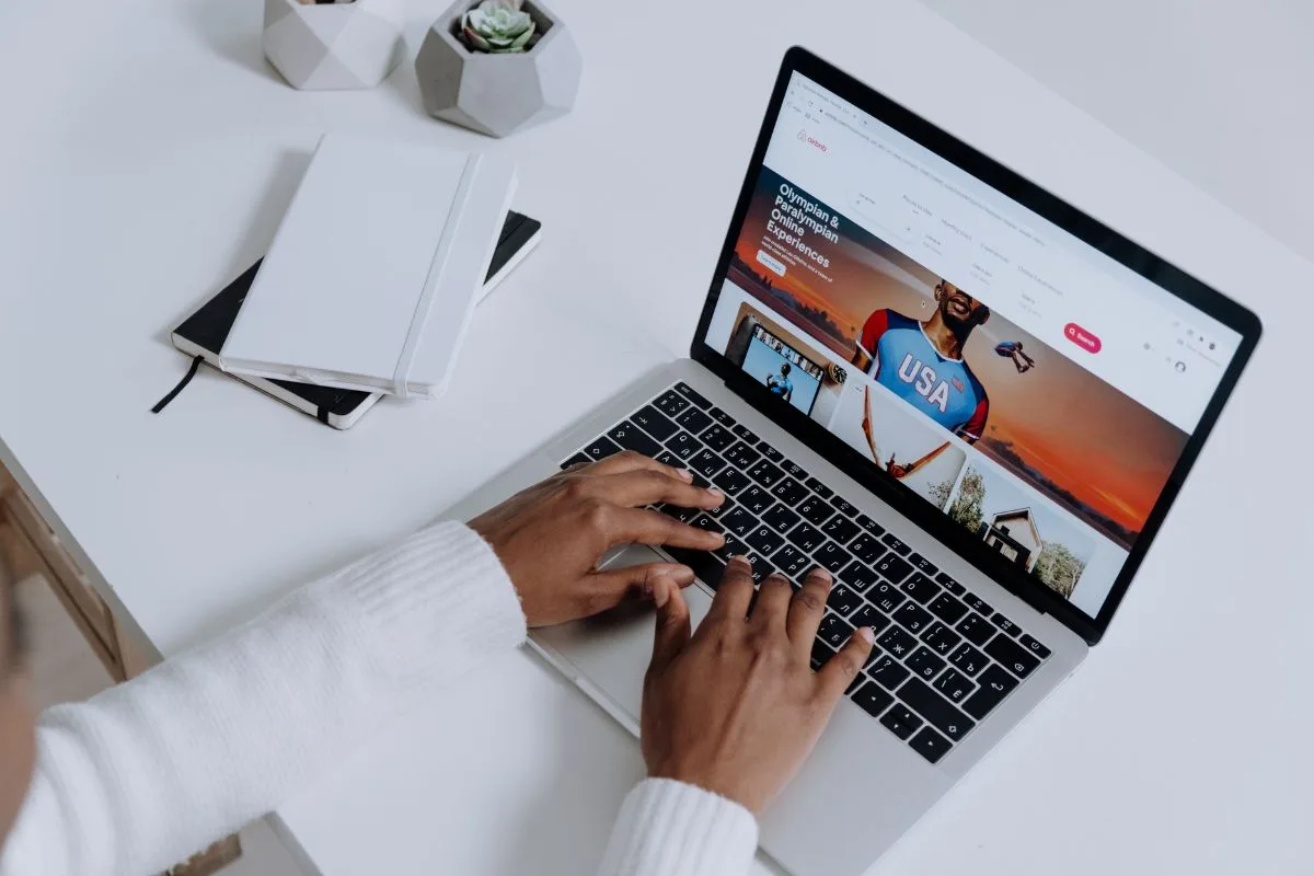Person browsing a small business website on a laptop