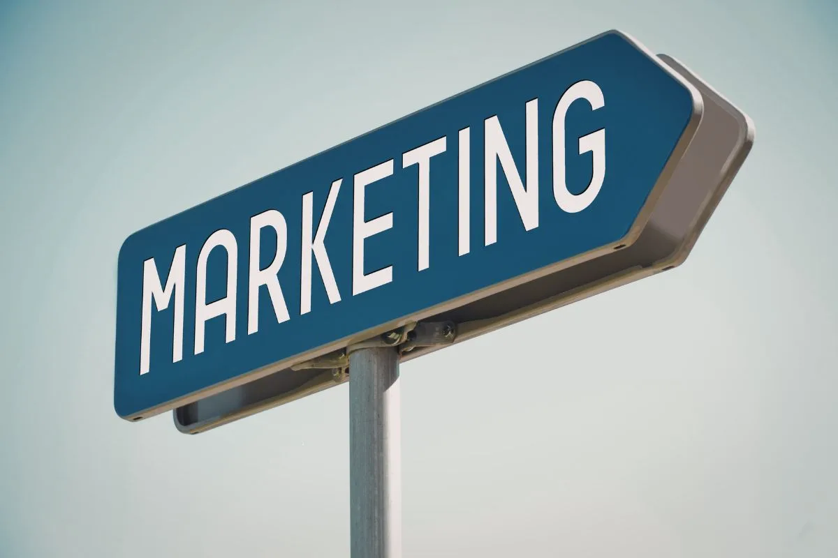 Marketing direction sign representing paid advertising decisions